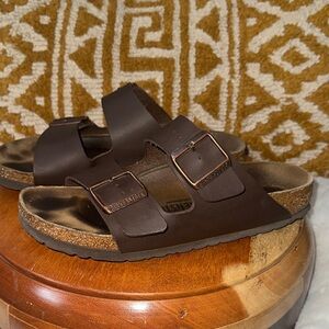 Birkenstock Arizona model in a dark brown leather